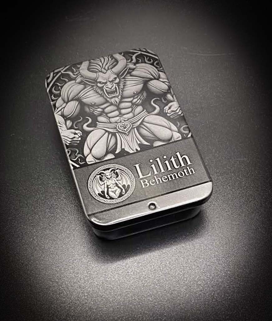 A dark metallic tin featuring an engraved illustration of Lilith, a horned demon, with the text 'Lilith Behemoth' on the front, set against a dark textured background.