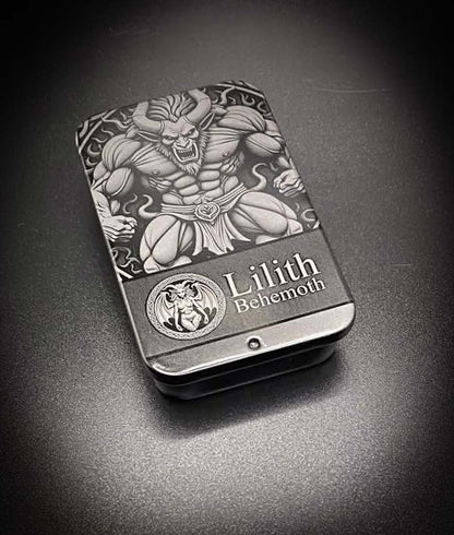 A dark metallic tin featuring an engraved illustration of Lilith, a horned demon, with the text 'Lilith Behemoth' on the front, set against a dark textured background.